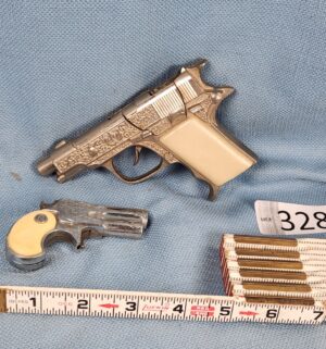 h328- vintage toy cap guns