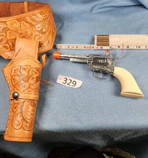 h329- vintage pony boy cap gun w/ belt