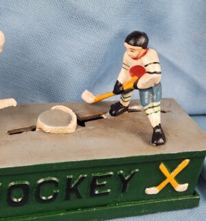 d598- vintage cast metal mechanical hockey coin bank - Image 3
