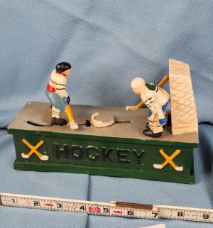 d598- vintage cast metal mechanical hockey coin bank - Image 4