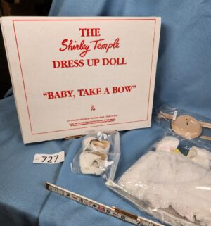 d727- Baby Take a Bow. Shirley Temple Dress Up Doll