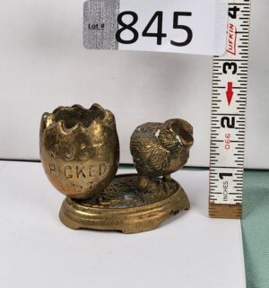 d845- brass chick and cracked egg toothpick holder.