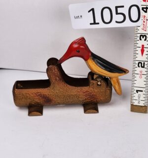 d1050- 1940s woodpecker toothpick dispenser