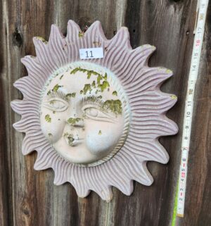 i11- Terracotta weathered white anthropomorphic sun design