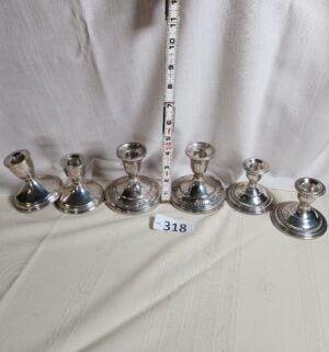 i318- Collection of weighted Sterling Silver Candle Holders