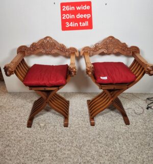 i354- pair of 19th-century Italian Renaissance Revival Savonarola chairs featuring hand-carved lion head armrests.