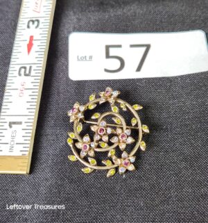 k57- Monet gold-tone rhinestone floral wreath brooch