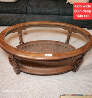 j62- vintage oval coffee table w/ cane shelf, glass top - Image 1