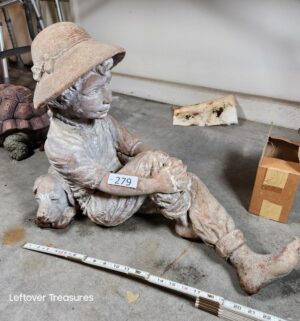 j279- Vintage Solid cement seated boy by wearing a hat - Image 1