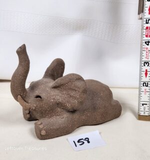 k158- Elephant Figurine. Signed by Margaret Hudson