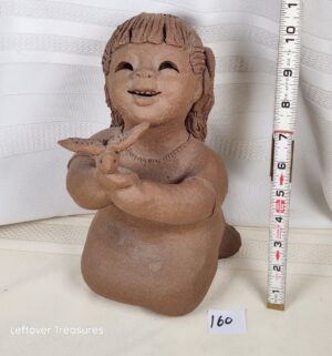k160- Girl with bird. Signed by Margaret Hudson