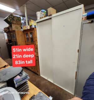 L74- Sliding Door Large Cabinet. No contents