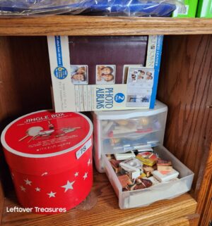 L78- craft items in bookcase