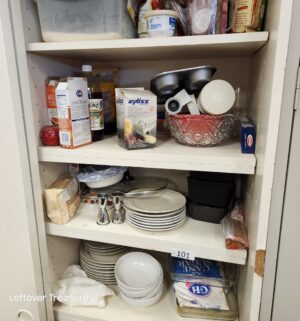 L101- All dishes & contents inside of cabinet