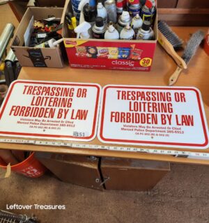 L151- pair of trespassing signs