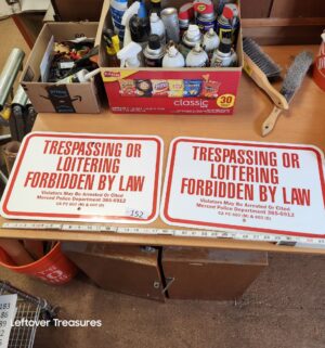 L152- pair of trespassing signs
