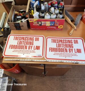 L153- pair of trespassing signs