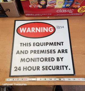 L154- warning 24 hour metal sign