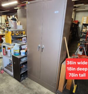 L219- Steel Cabinet. No key. No contents