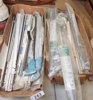 L243- collection of drawer slides and related hardware