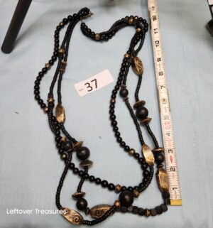 p37- Long costume necklace