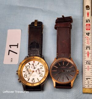 p71- two Nixon Watches