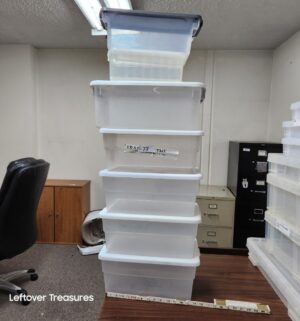 M77- 1 stack of various storage totes