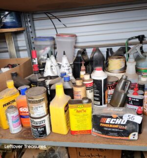 n56- oil, chemicals and other products on shelves. Some are full