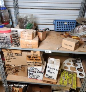 n62- Misc contents on the shelving Unit. Boxes describe contents within
