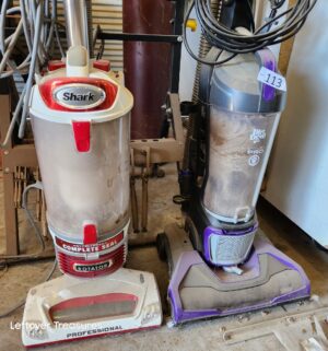 n113- Two vacuums.