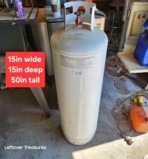 n378- 100 lb propane cylinder. Empty