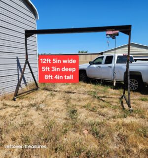 n390- portable steel gantry crane. Comes apart. Sold with hoist