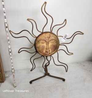 o240- wrought iron and terracotta sun face sculpture - Image 1