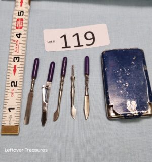 p119- vintage miniature manicure tool set in a blue metal case