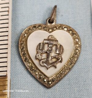 p263- Sterling Silver World War II-era U.S. Navy sweetheart locket