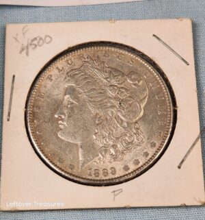 p276- 1889 Morgan Silver Dollar