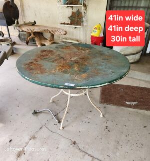 q46- vintage metal top, iron leg patio table
