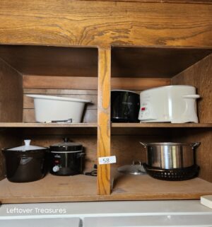 q58- Cookware in cabinet