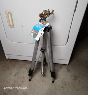 r114- Melnor brass implact sprinkler on tripod