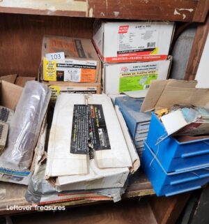 s103- nails, staples, hardware, orgainzers on shelf