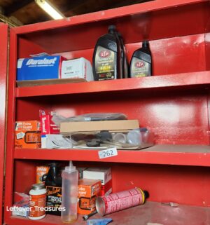 s262- items in red cabinet