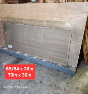 s270- large glass panels. Includes wood and rolling stand