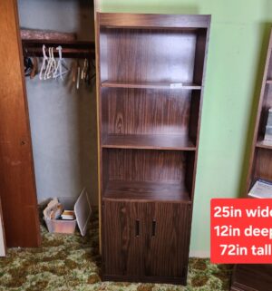 t7- particle board bookcase w/ cabinet