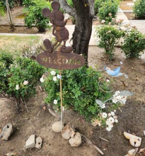 t41- rustic cast iron Mickey Mouse Welcome garden stake