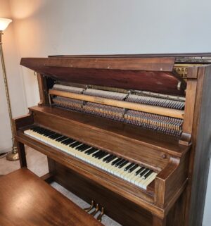 t84- Melodigrand Upright Piano w/ bench. Buyer to bring assistance to move. Moving equipment available to use. - Image 3