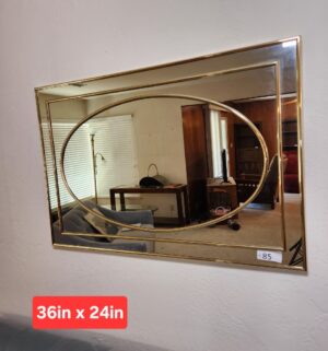 t85- Mid Century gold-toned metal and glass mirror