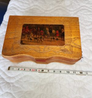 t171- wooden jewelry box featuring a hinged lid with a framed equestrian hunting scene