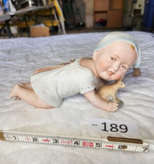 t189- 1920s German bisque porcelain piano baby
