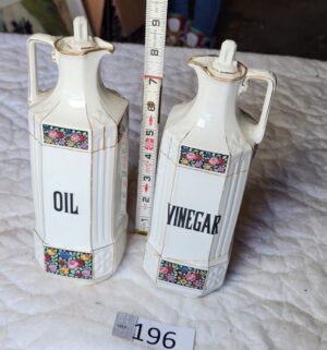 t196- oil and vinegar cruets from Czechoslovakia. 1 is damaged