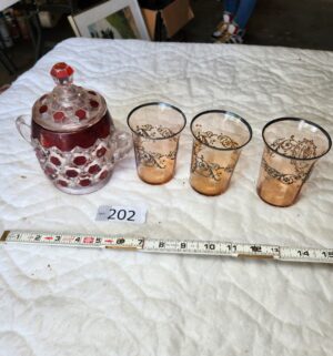 t202- Indiana Glass Flower Medallion Jar. Pink and Black Silver Rim Glasses